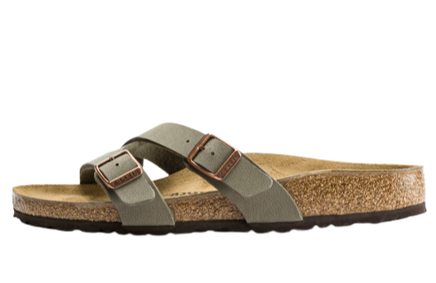 A geometrically designed strap sandal. The Yao couples style with a touch of luxury and features the iconic BIRKENSTOCK footbed to provide both comfort and flair. Shown in Birko-Flor® nubuck. Anatomically shaped cork-latex footbed Upper: Birko-Flor® Nubuck Footbed lining: suede Sole: EVA Details: two straps, each with an individually adjustable metal tongue buckle “Made in Germany”