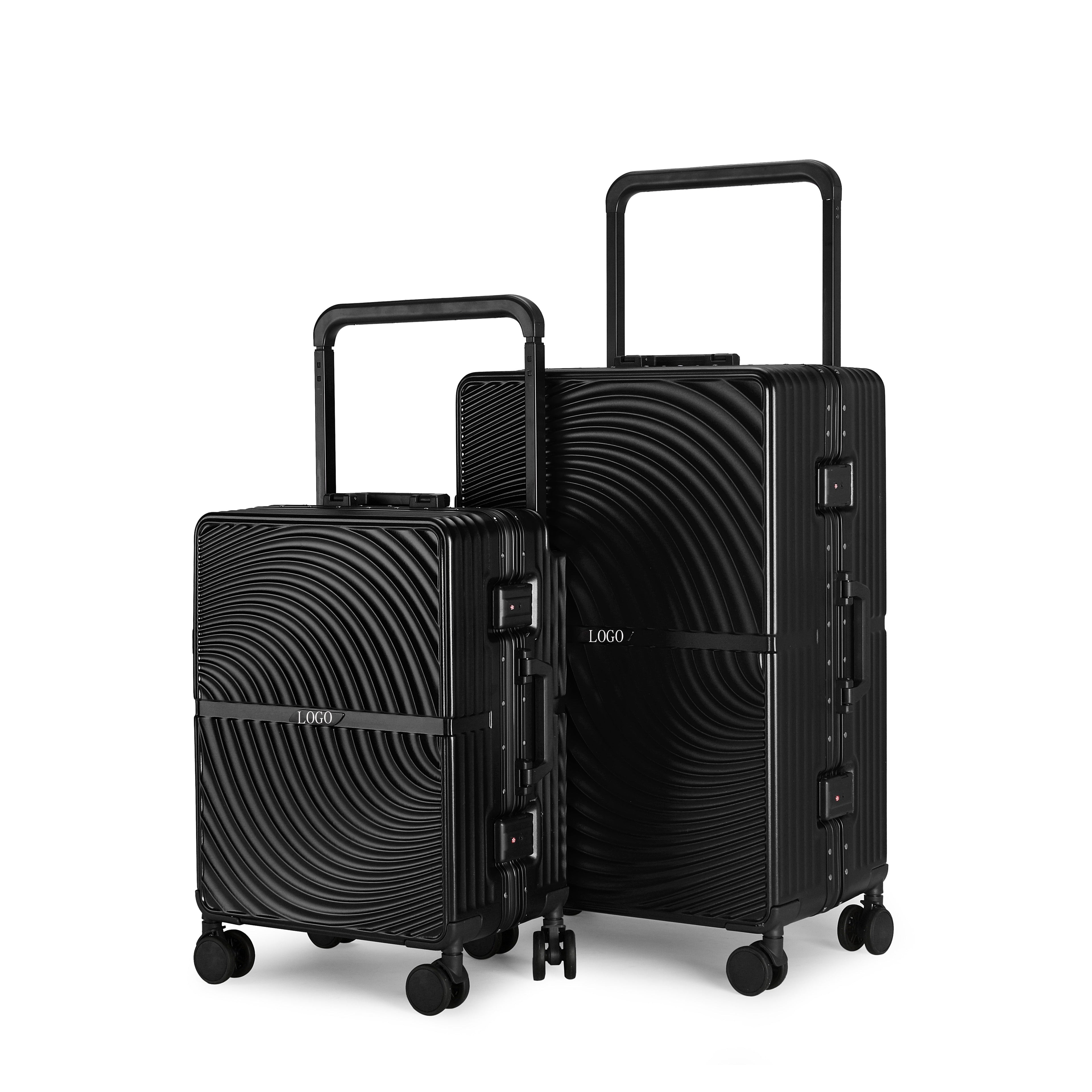 Ensemble de deux valises rigides noires en polycarbonate avec cadre aluminium et design ondulé, tailles cabine S et soute M.